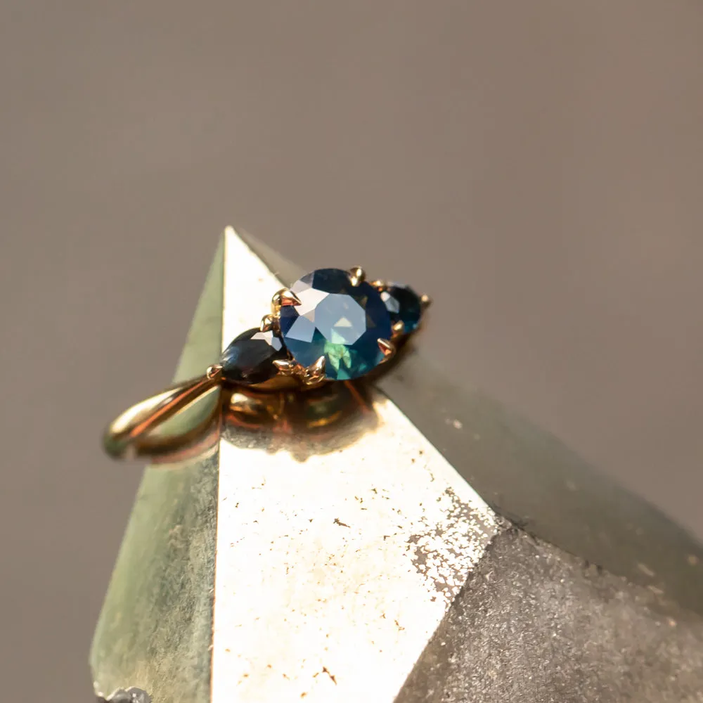 1.03ct Untreated Teal Nigerian Sapphire Three Stone Ring in 18K Yellow Gold