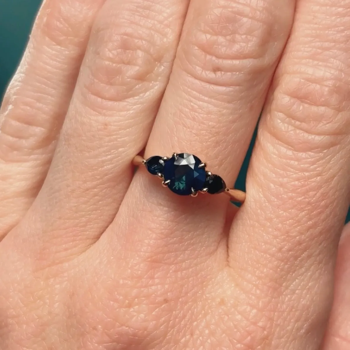 1.03ct Untreated Teal Nigerian Sapphire Three Stone Ring in 18K Yellow Gold