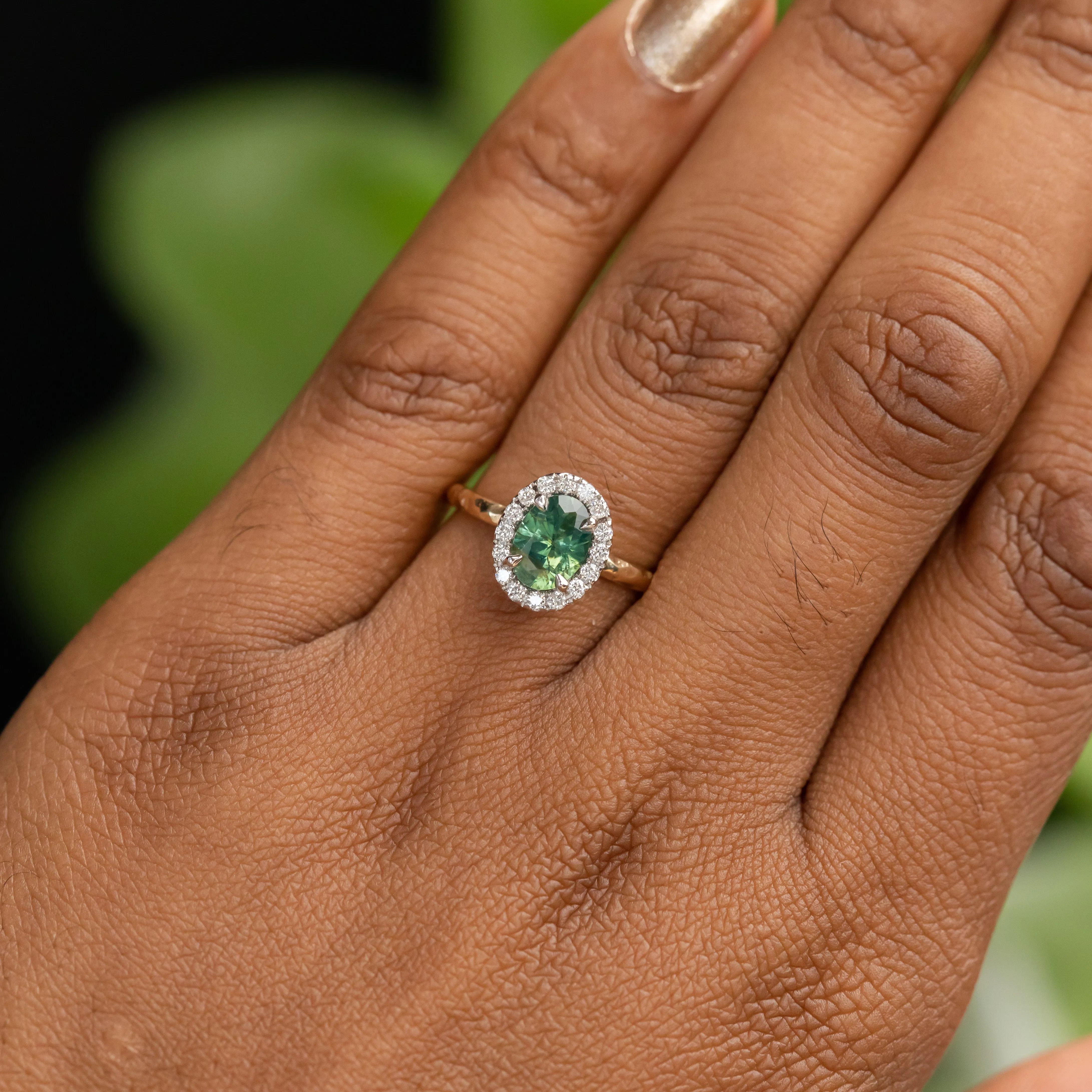 1.20ct Silky Oval Green Madagascar Sapphire and Diamond Four Prong Halo Ring in 14K White Gold Halo and 14k Yellow Gold Shank